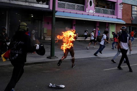 Man set on fire during Venezuela protests